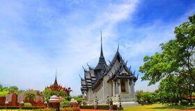 Ancient Temple with flower Garden, Thailand